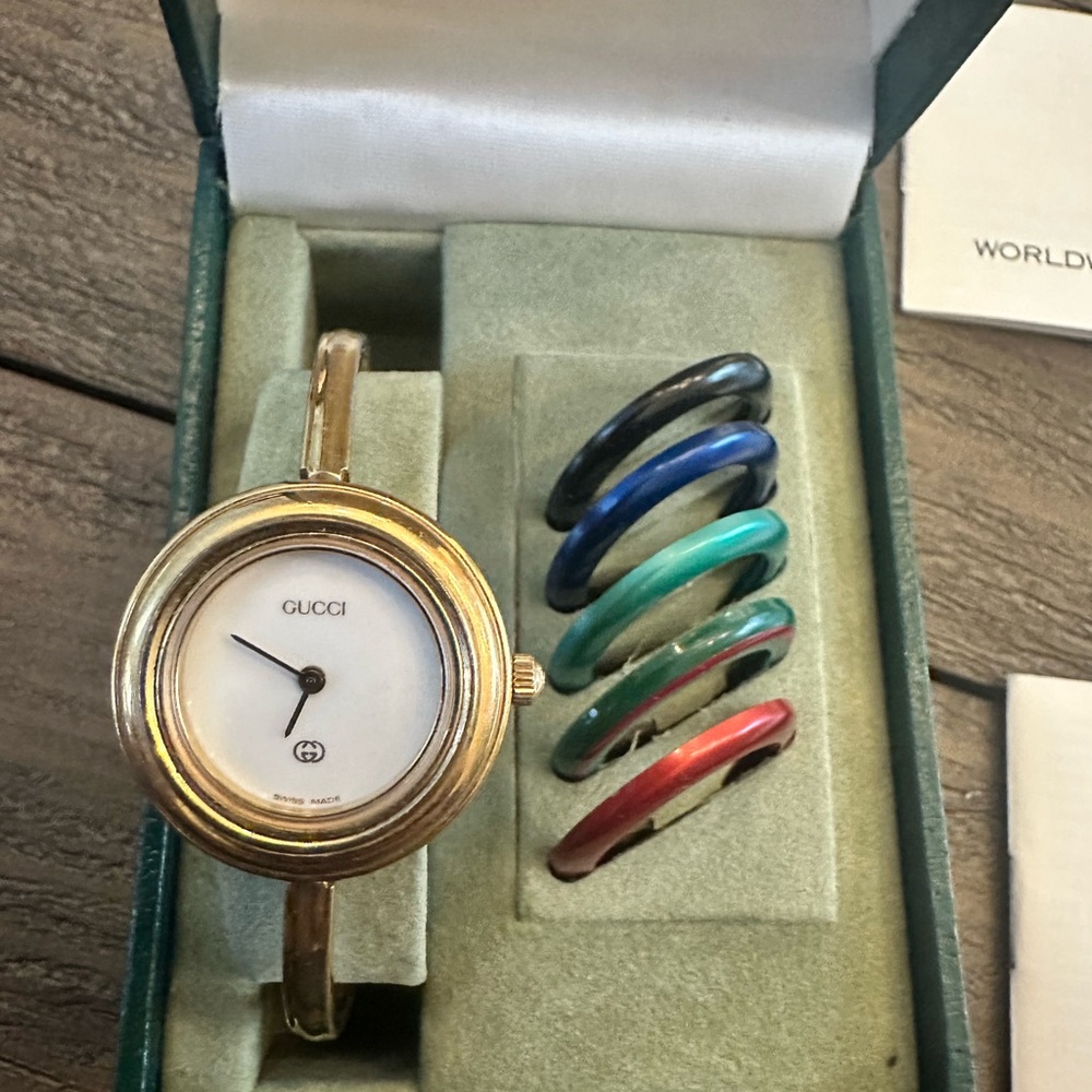 Vintage Gucci Women's Gold Watch with Colorful Bezels